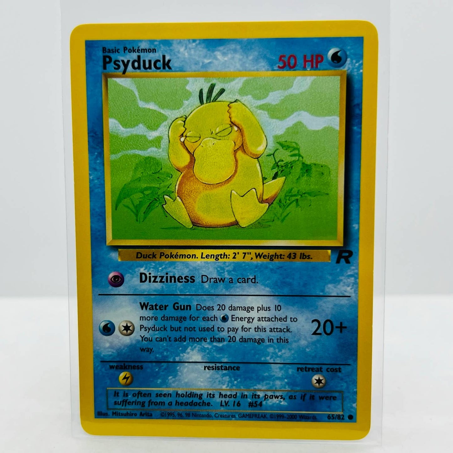 Pokémon Psyduck 65/82 Team Rocket 2000 WOTC Unlimited Common Card NM-MT